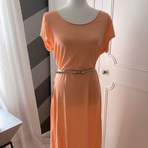 The limited peach/orange polkadot mid length dress